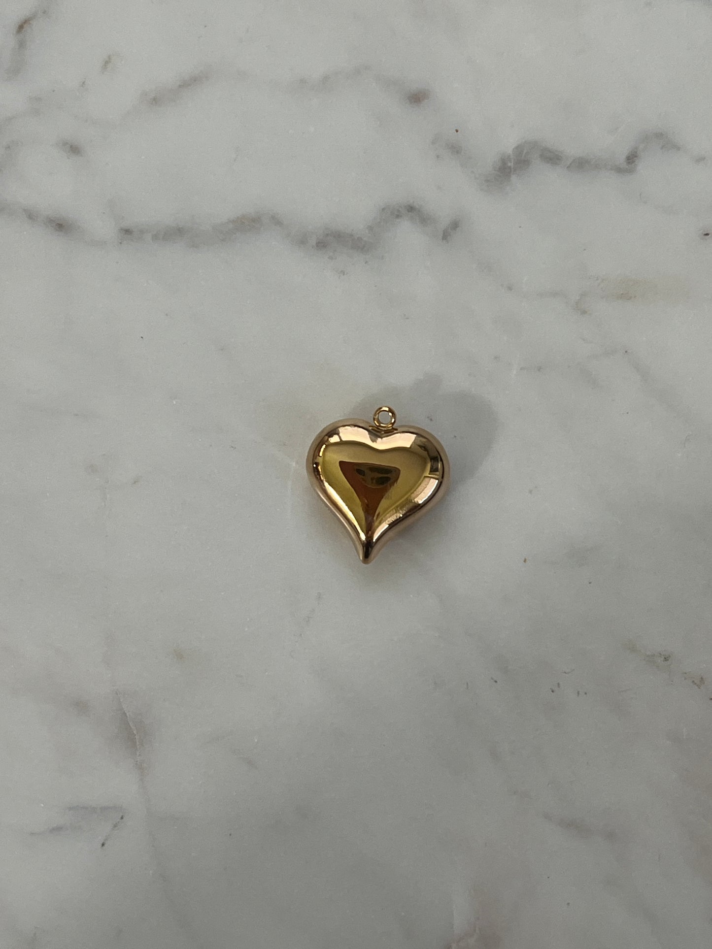Gold heart charm