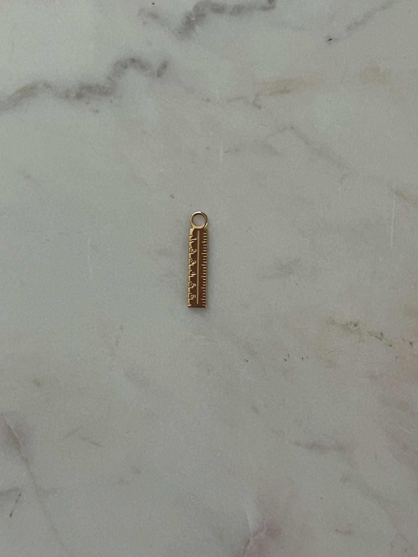 Ruler charm