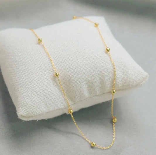 Gold ball bead necklace