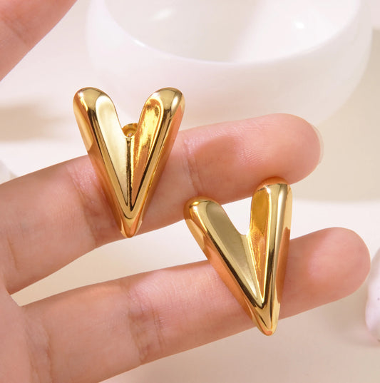 Golden cupid studs