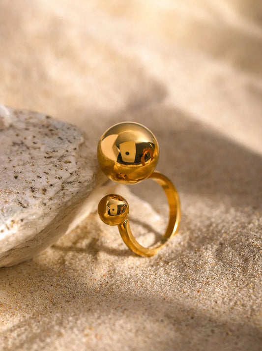 Asymmetrical ball ring