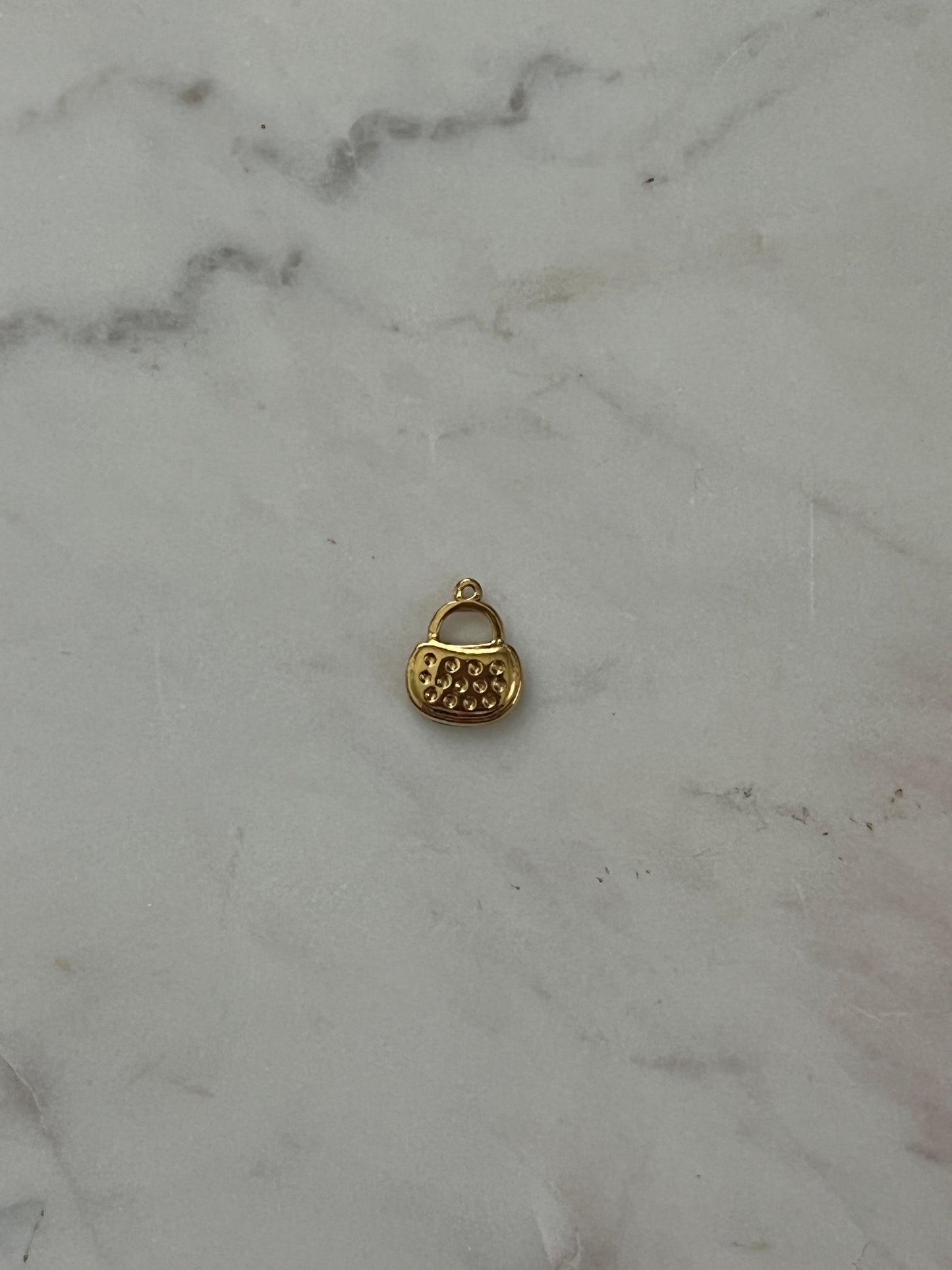 Gold bag charm