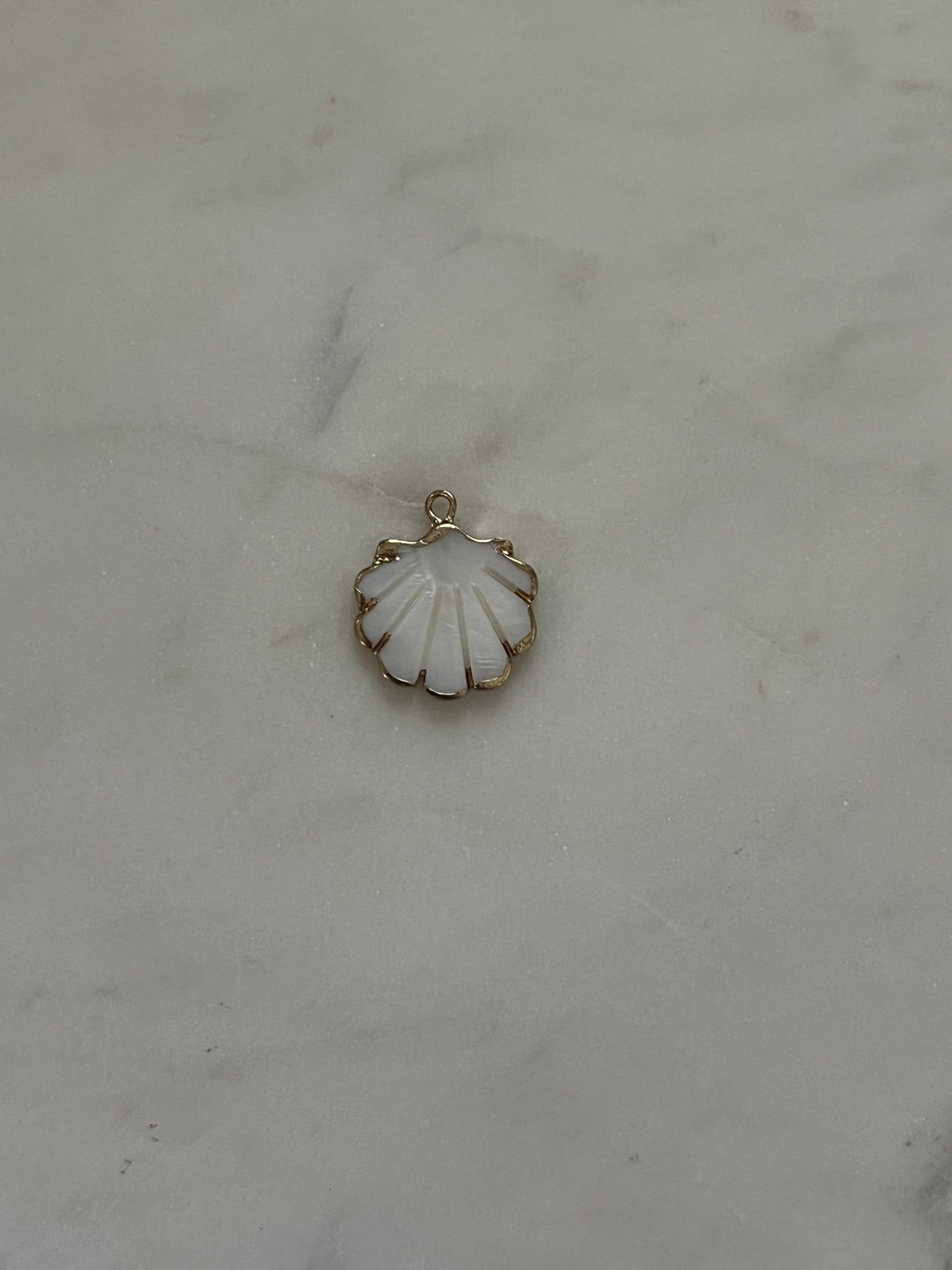 White shell charm